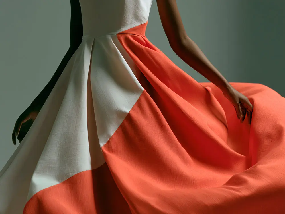 A colour-blocked dress — two solid fabrics joined by a clean seam line