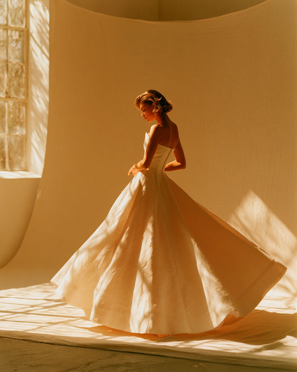 The A-line silhouette — fitted through the bodice, flaring gently from the waist