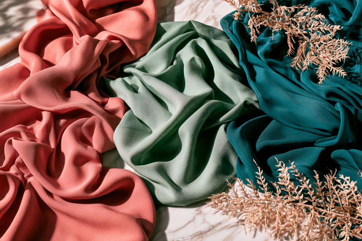 A summer wedding guest dress in viscose — fabric choice determines the impression more than any other factor